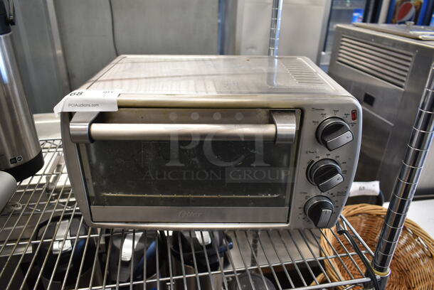 Oster TSSTTVCG04 Metal Countertop Electric Powered Toaster Oven. 120 Volts, 1 Phase. Tested and Working! - Image 1 of 4
