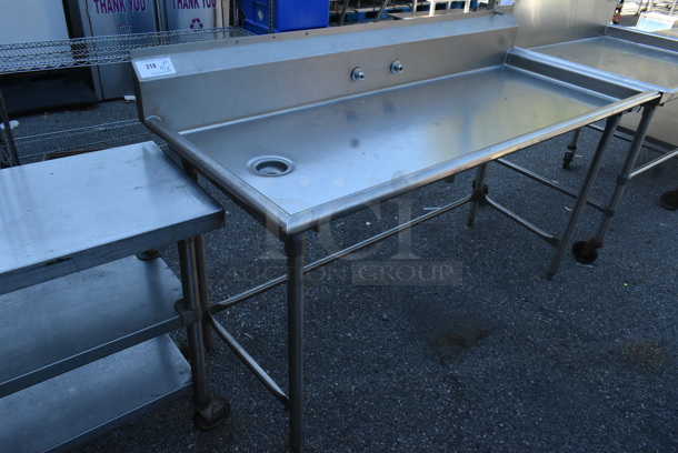 Stainless Steel Commercial Table w/ Drain and Back Splash. 