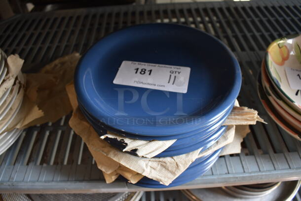 11 Blue Ceramic Plates. 9x9x1. 11 Times Your Bid!