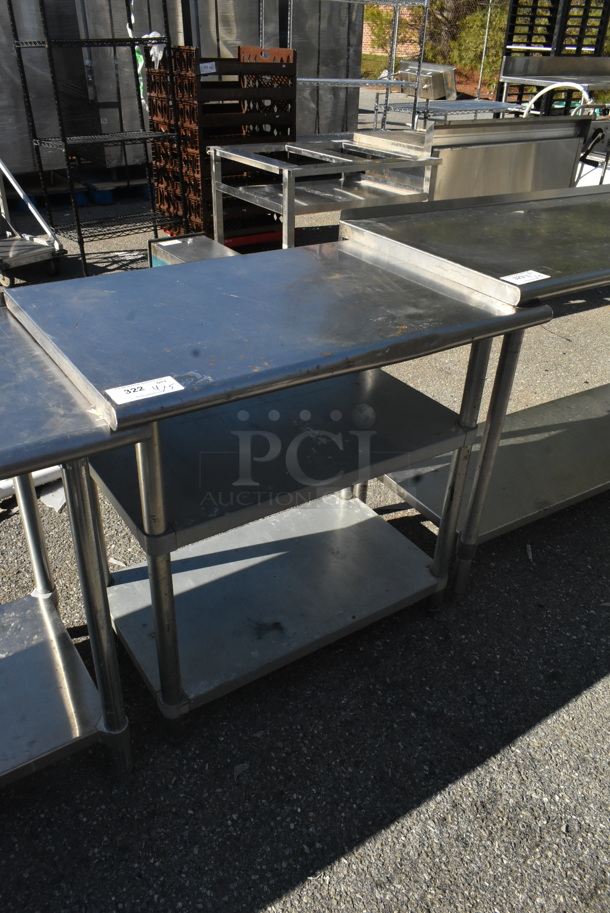 Stainless Steel Table w/ 2 Metal Under Shelves. 