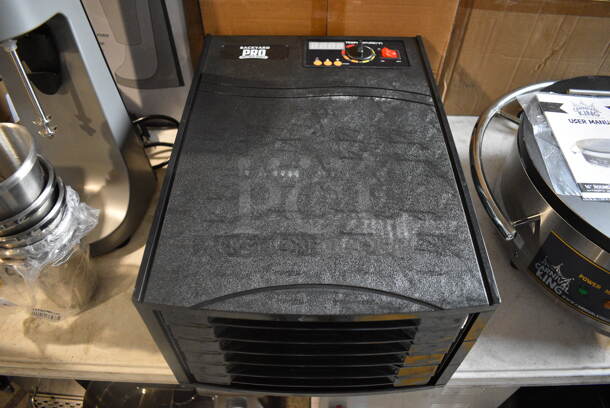 BRAND NEW SCRATCH AND DENT IN BOX! Backyard Pro 554BSD6T Butcher Series Black Poly Countertop 6 Rack Dehydrator w/ 40 Hour Timer. 120 Volts, 1 Phase. 13x18x8.5. Tested and Working!
