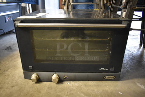 2012 Cadco XAF013-US Lisa Stainless Steel Commercial Countertop Electric Powered Convection Oven w/ View Through Door and Metal Oven Rack. 120 Volts, 1 Phase. Tested and Working!