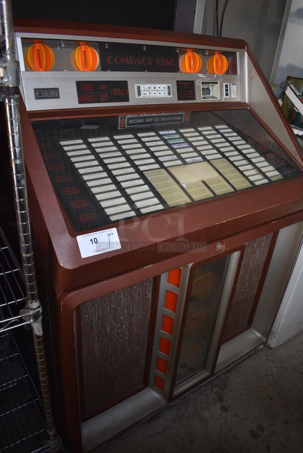 AMI Metal Commercial Floor Style Jukebox. 41x27x54. Tested and Powers On - Cannot Test Without Key - Image 5 of 7