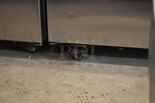 2013 True TG2R-2S ENERGY STAR Stainless Steel Commercial 2 Door Reach In Cooler w/ Poly Coated Racks on Commercial Casters. 115 Volts, 1 Phase. Tested and Working! - Image 4 of 8