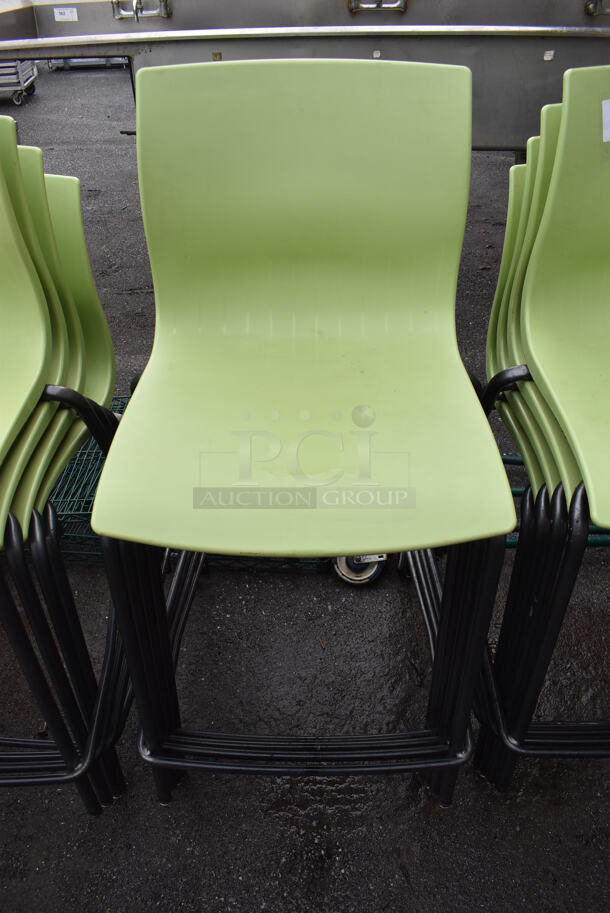 9 Green Poly Bar Height Chairs on Metal Legs. 21x25x39. 9 Times Your Bid!