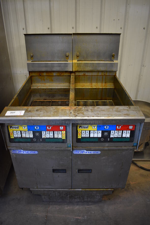 2012 Pitco Frialator Model SSH55 Solstice Supreme Stainless Steel Commercial Natural Gas Powered 2 Bay Deep Fat Fryer w/ Filtration System on Commercial Casters. 80,000 BTU. 31.5x34.5x48