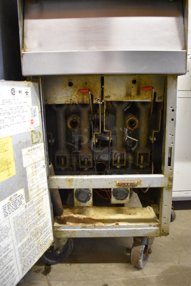 2019 Frymaster SM220GN Stainless Steel Commercial Floor Style Natural Gas Powered Deep Fat Fryer on Commercial Casters w/ Metal Fry Basket and 2 Side Splash Guards. 50,000 BTU. 16x31x47 - Image 6 of 7