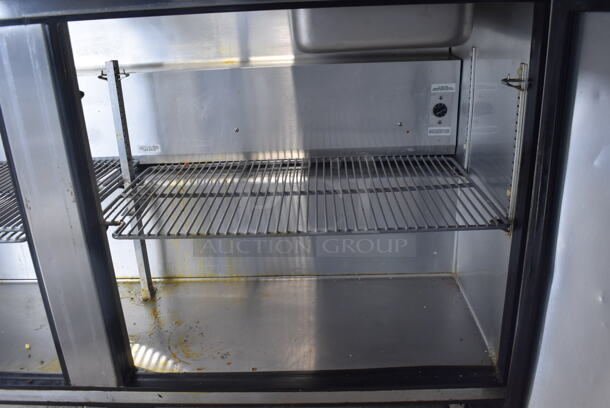 2015 Model True TSSU-60-24M-B-ST Commercial Stainless Steel Sandwich/Salad Prep Table With Overhead Shelving, Steel Pans And Refrigerated Base With Steel Racks. 115V/1 Phase. Tested And Working - Image 6 of 7