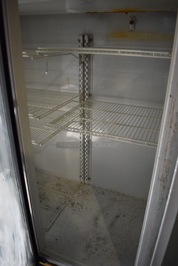 Kelvinator Model T80MGP Metal Commercial 3 Door Reach In Cooler Merchandiser w/ Poly Coated Racks on Commercial Casters. 115 Volts, 1 Phase. 78x37x78. Tested and Working! - Image 4 of 6