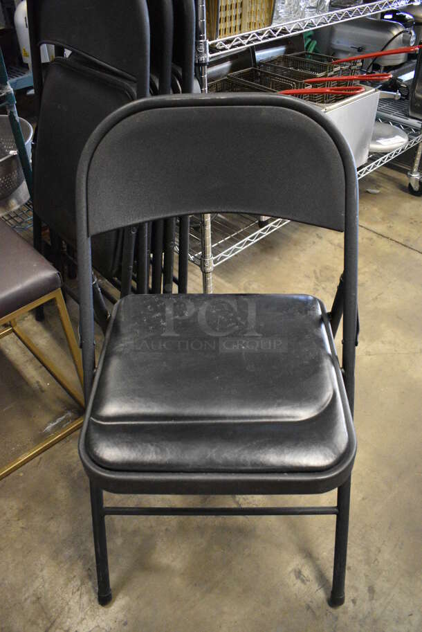 4 Black Metal Folding Chairs w/ Black Seat Cushion. 20x2x34. 4 Times Your Bid! - Image 1 of 3