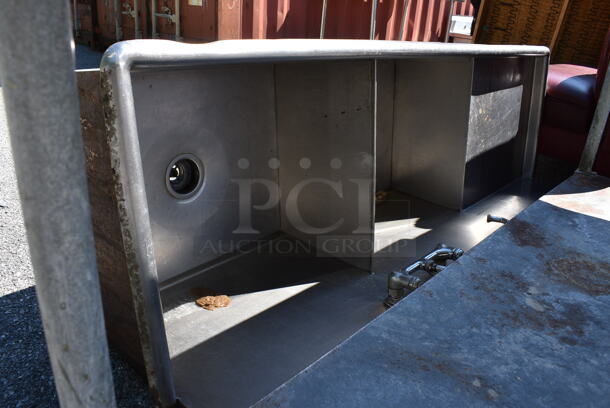Stainless Steel Commercial 2 Bay Sink w/ Left Side Drain Board. Has One Leg. 75x24x45. Bay 24x21x12. Drain Board 24x21x2