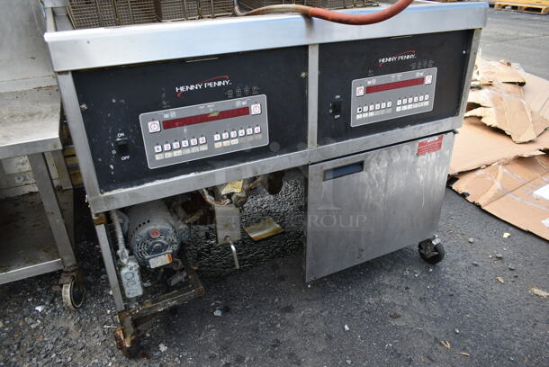 Henny Penny Stainless Steel Commercial Floor Style Natural Gas Powered 2 Bay Deep Fat Fryer w/ 4 Metal Fry Baskets on Commercial Casters. - Image 2 of 5