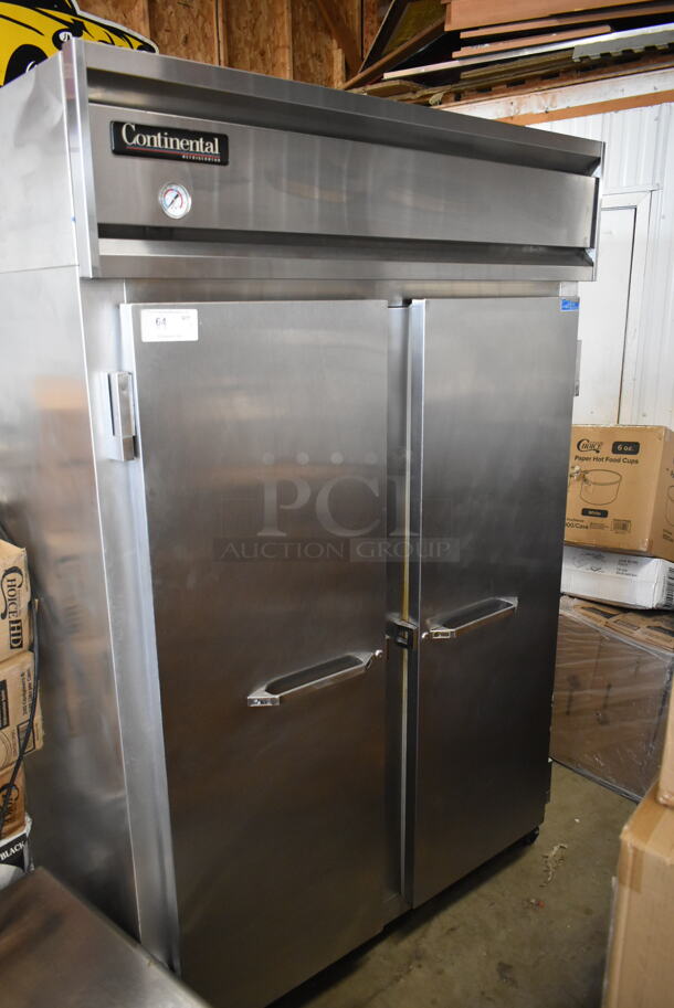 Continental 2R Stainless Steel Commercial 2 Door Reach In Cooler w/ Poly Coated Racks. 115 Volts, 1 Phase. Tested and Powers On But Does Not Get Cold - Image 1 of 5