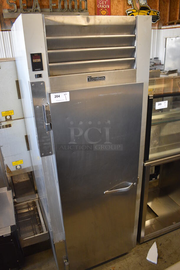 Traulsen Stainless Steel Commercial Single Door Reach In Cooler. 30x35x77.5. Tested and Powers On But Temps at 58 Degrees