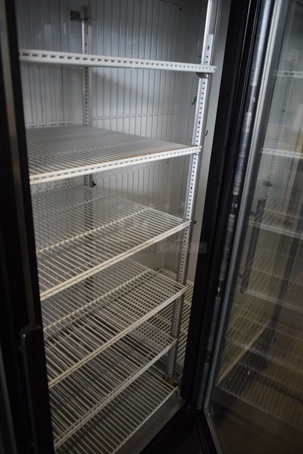 True GDM-72F-LD ENERGY STAR Metal Commercial 3 Door Reach In Freezer Merchandiser w/ Poly Coated Racks. 115/208-230 Volts, 1 Phase.  - Image 3 of 5