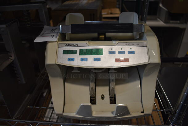 AAccurate Model 1200 Metal Countertop Bill Counting Machine. 110 Volts, 1 Phase. 11x9.5x9.5