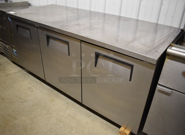 2011 True TUC-72 ENERGY STAR Stainless Steel Commercial 3 Door Undercounter Cooler on Commercial Casters. Missing 1 Caster. 115 Volts, 1 Phase. 72.5x30x35. Tested and Working! - Image 1 of 8