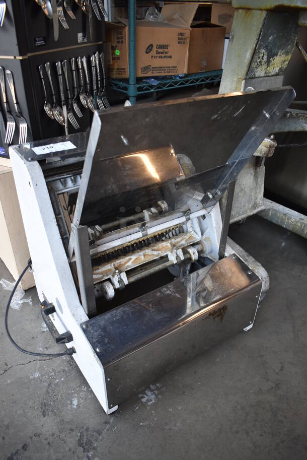 2013 Metal Commercial Countertop Bread Loaf Slicer. 110 Volts, 1 Phase. 25x24x31. Tested and Working!