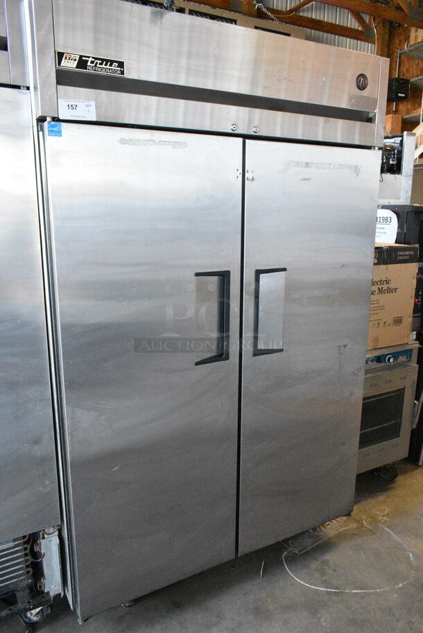 True TG2R-2S ENERGY STAR Stainless Steel Commercial 2 Door Reach In Cooler w/ Poly Coated Racks on Commercial Casters. 115 Volts, 1 Phase. Tested and Working! - Image 1 of 6