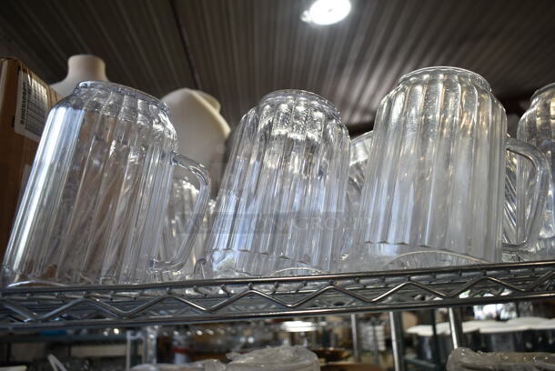 ALL ONE MONEY! 5 Tiers of Various Items Including Poly Pitchers, Ceramic Dishes, Glassware. Does Not Include Shelving Unit.  - Image 2 of 12