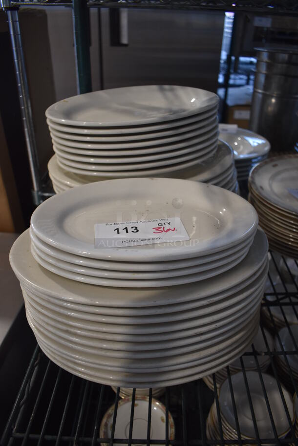 ALL ONE MONEY! Lot of 36 Various White Ceramic Oval Plates. Includes 10x7.5x1 - Image 1 of 3