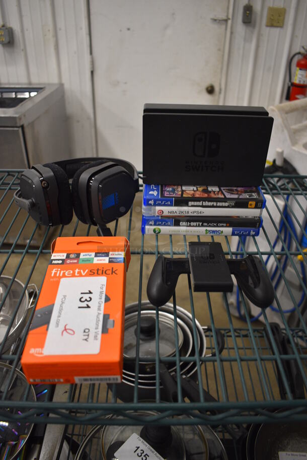 ALL ONE MONEY! Lot of Nintendo Switch Base, Nintendo Joycon Holder Controller, PS4 Games, Headphones and Fire TV Stick!