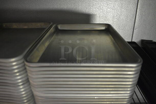 24 Metal Baking Pans. 9.5x13x1. 24 Times Your Bid!  (kitchen) - Image 1 of 3