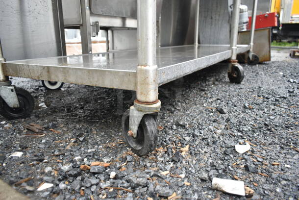 Eagle Stainless Steel Commercial Table w/ Back Splash and Under Shelf on Commercial Casters.  - Image 3 of 4