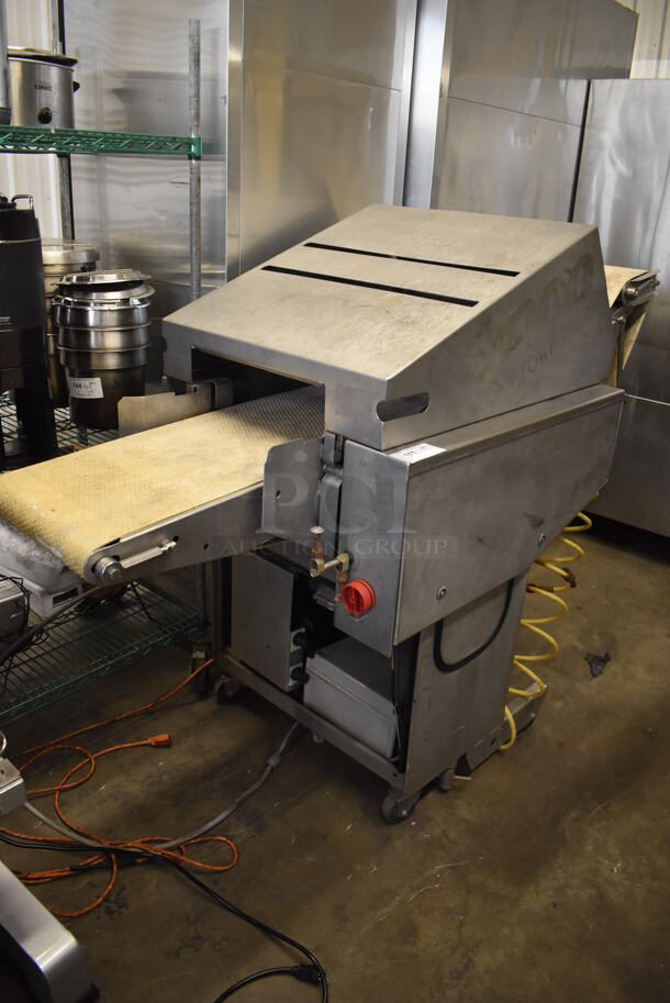 Townsend 9000 Stainless Steel Commercial Floor Style Automatic Membrane Skinner on Commercial Casters. 125-250 Volts, 1 Phase. 80x29x54 - Image 1 of 7
