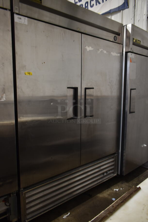 2016 True T-49F ENERGY STAR Stainless Steel Commercial 2 Door Reach In Freezer w/ Poly Coated Racks on Commercial Casters. 115 Volts, 1 Phase. Tested and Working!