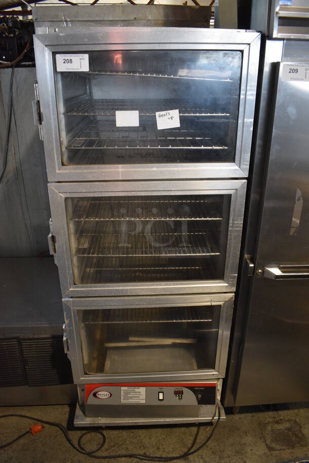Bevles Stainless Steel Commercial Heated Holding Cabinet on Commercial Casters. 120 Volts, 1 Phase. 29x37x71.5. Tested and Powers On But Does Not Get Warm