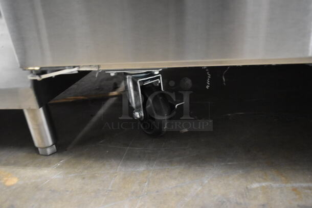 BRAND NEW SCRATCH AND DENT! 2023 KoolMore FWT-2D-12C Stainless Steel Commercial 2 Door Work Top Freezer on Commercial Casters. 115 Volts, 1 Phase. Tested and Working! - Image 4 of 7