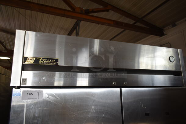 2012 True TG2R-2S ENERGY STAR Stainless Steel Commercial 2 Door Reach In Cooler w/ Poly Coated Racks on Commercial Casters. 115 Volts, 1 Phase. Tested and Working! - Image 2 of 7