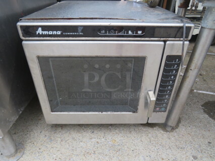 One Amana Microwave. 20X24X18