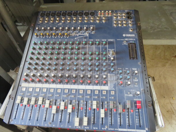 One Portable Case On Casters With  A Yamaha Mixing Console #MG166CX, And A DBX 215S Graphic Equalizer, And VFI V8000. 28X30X36 - Image 1 of 4