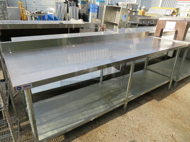 One Stainless Steel Table With Under Shelf And Back Splash. 96X30X38