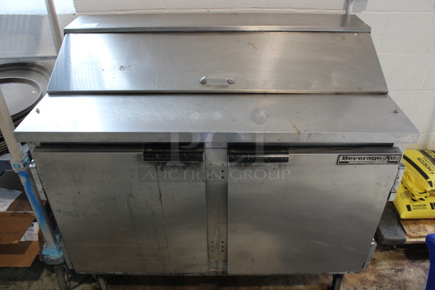 Beverage Air Model SP48-12 Stainless Steel Commercial Sandwich Salad Prep Table Bain Marie Mega Top on Commercial Casters. 115 Volts, 1 Phase. 48x30x41.5. Tested and Powers On But Does Not Get Cold
