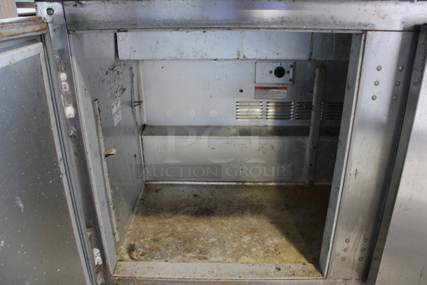 Beverage Air Model SP48-12 Stainless Steel Commercial Sandwich Salad Prep Table Bain Marie Mega Top on Commercial Casters. 115 Volts, 1 Phase. 48x30x41.5. Tested and Powers On But Does Not Get Cold - Image 7 of 8