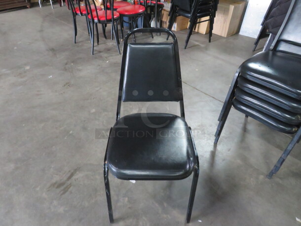 Black Metal Stack Chair With Black Cushioned Seat And Back. 5XBID