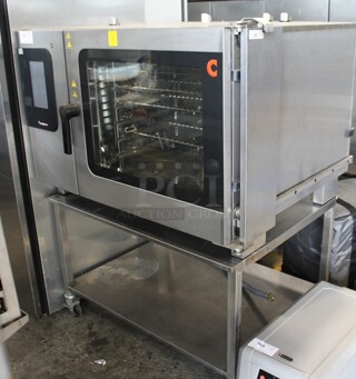 Convotherm C4eT 6.20 GS Stainless Steel Commercial Natural Gas Powered Combination Convection Oven on Stainless Steel Equipment Stand w/ Commercial Casters. 68,200 BTU.