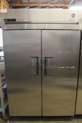 2015 True TG2R-2S ENERGY STAR Stainless Steel Commercial 2 Door Reach In Cooler w/ Poly Coated Racks on Commercial Casters. 115 Volts, 1 Phase. Tested and Working!
