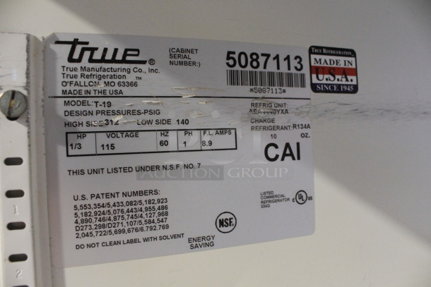 True T-19 Stainless Steel Commercial Single Door Reach In Cooler w/ Poly Coated Racks on Commercial Casters. 115 Volts, 1 Phase. Tested and Powers On But Does Not Get Cold
 - Image 2 of 5