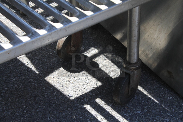 Metal 4 Tier Shelving Unit on Commercial Casters. BUYER MUST DISMANTLE. PCI CANNOT DISMANTLE FOR SHIPPING. PLEASE CONSIDER FREIGHT CHARGES. - Image 2 of 2