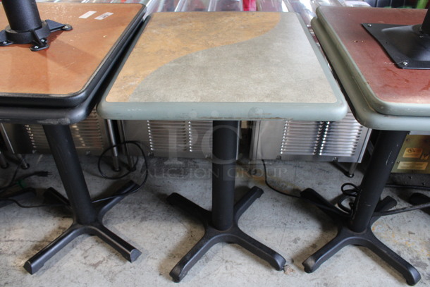 Tan and Gray Green Dining Table on Black Metal Table Base. Stock Picture - Cosmetic Condition May Vary. 24x20x30