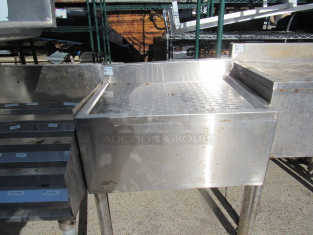 One Stainless Steel Sani Safe Under Bar Drain Table. 24X19X27