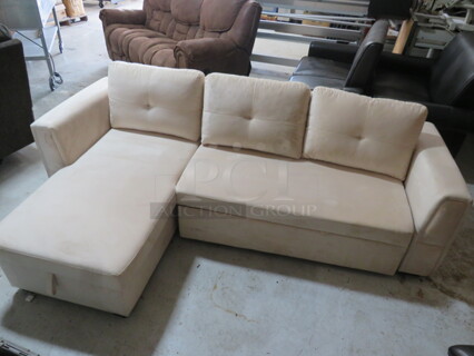 One Sectional White Couch With Storage And Pull Out Bed. 