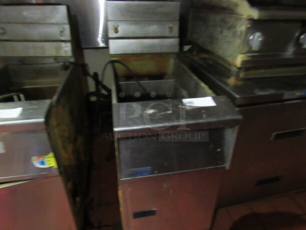One SS Pitco Natural Gas Deep Fryer On Casters. 16X35X46