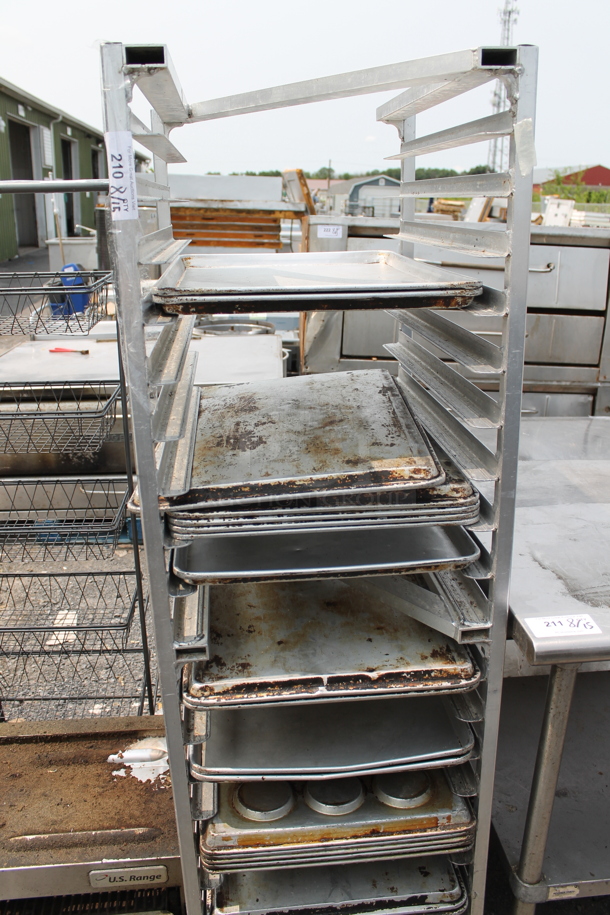 Metal Commercial Pan Transport Rack w/ Various Metal Baking Pans on Commercial Casters.  - Image 1 of 3