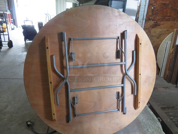 One 60 Inch Round Folding Wooden Banquet/Event Table. - Image 3 of 3