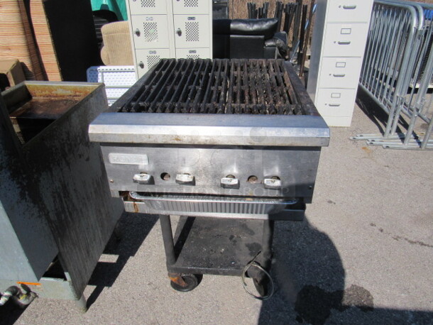 One Stainless ROYAL Natural Gas Table Top Charbroiler On Stainless Steel Equipment Stand On Casters. 24X30X38